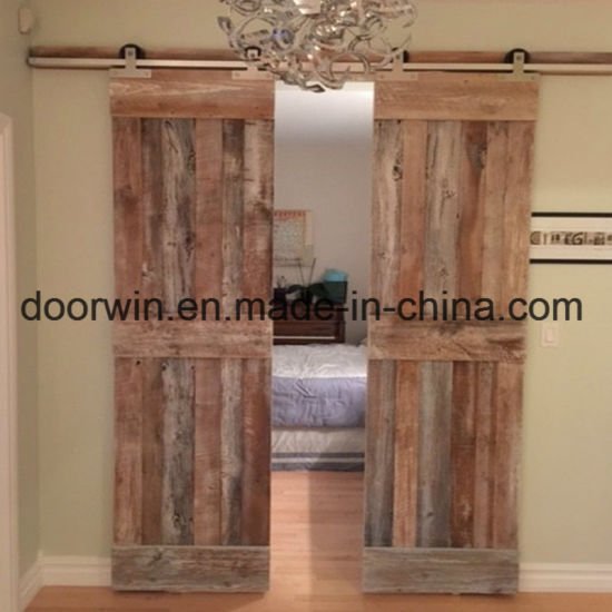 Fashion Style Brown Color Wooden Double Door Designs Sliding American Barn Door with Barn Door Hardware - China Knotty Alder Wooden Door, Pine Larch Wooden Door - Doorwin Group Windows & Doors