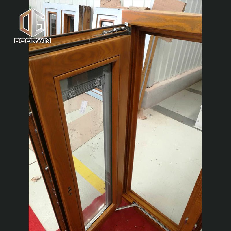 Aluminum clad oak wood French push out casement window - Doorwin Group Windows & Doors