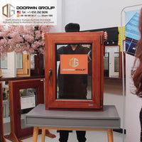 American Standard Solid Red Oak Wood clad aluminum inward opening french windows by Doorwin — thumbnail 2