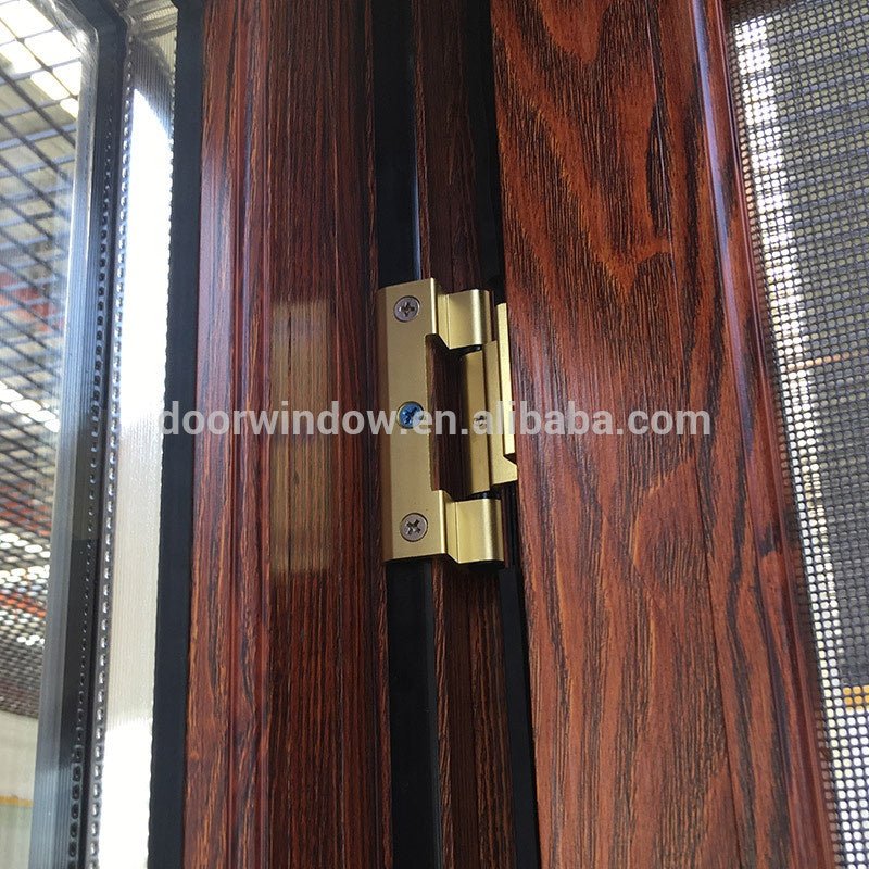 Brown color thermal break aluminum out-swing windows with mosquito nets by Doorwin - Doorwin Group Windows & Doors