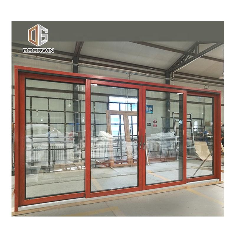 DOORWIN 2021wood aluminum frame balcony commercial automatic sliding glass doors by Doorwin on Alibaba — product image 1