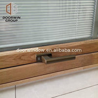 DOORWIN 2021wood frame shutters awning window by Doorwin on Alibaba — thumbnail 3