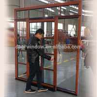 DOORWIN 2021Wooden color aluminum sliding doors aluminium door wood grain finish by Doorwin on Alibaba — thumbnail 3