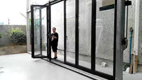 DOORWIN 2021Wooden color fold door wholesale doors usa approved aluminium casement by Doorwin on Alibaba — thumbnail 1