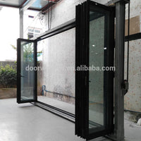 DOORWIN 2021Wooden color fold door wholesale doors usa approved aluminium casement by Doorwin on Alibaba — thumbnail 2