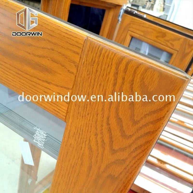 Double glazed aluminium wood composite door and windows frame decorative aluminum cladding doors by Doorwin on Alibaba - Doorwin Group Windows & Doors