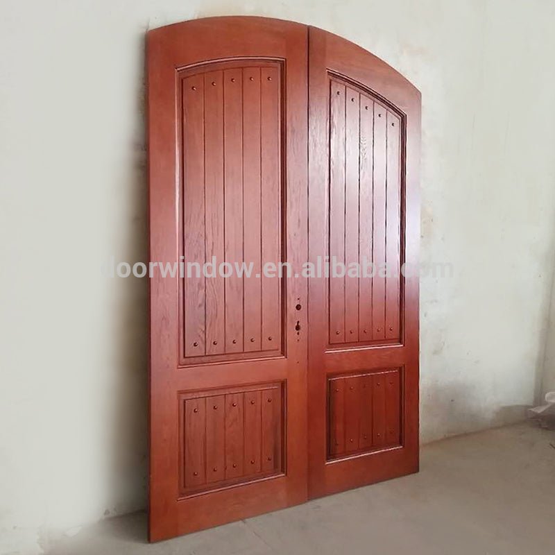 Finished product house front main double door design made of red oak wood flat solid wood doors by Doorwin - Doorwin Group Windows & Doors