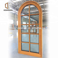 French style fixed wood window with wood window grille design made of teak woodby Doorwin — thumbnail 2