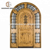 Front door styles pictures antique arched doors V-groove panels hotel entry doors to sale by Doorwin — thumbnail 1