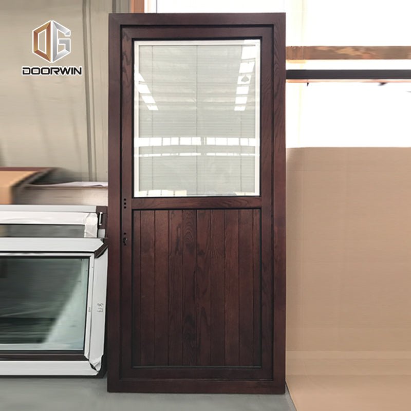 Glass louver pivot door front wood double designs by Doorwin on Alibaba - Doorwin Group Windows & Doors