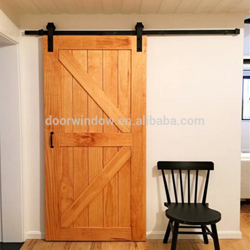 Hanging sliding barn door with wooden sliding door roller by Doorwin - Doorwin Group Windows & Doors