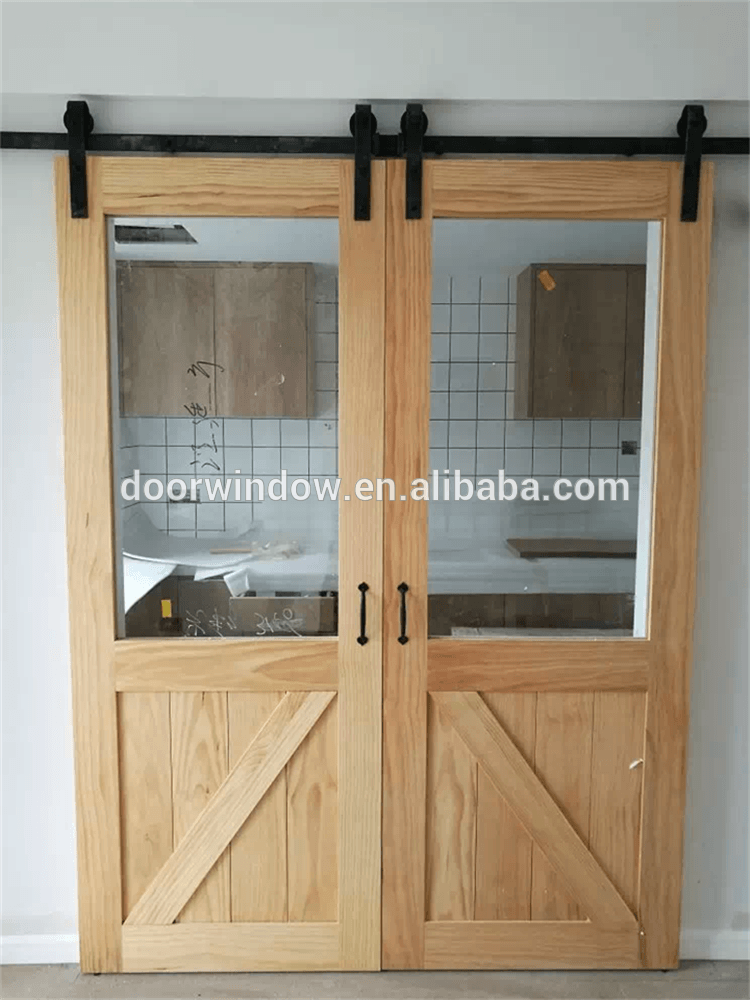 Interior wood partition design glass insert wooden barn door by Doorwin — product image 2