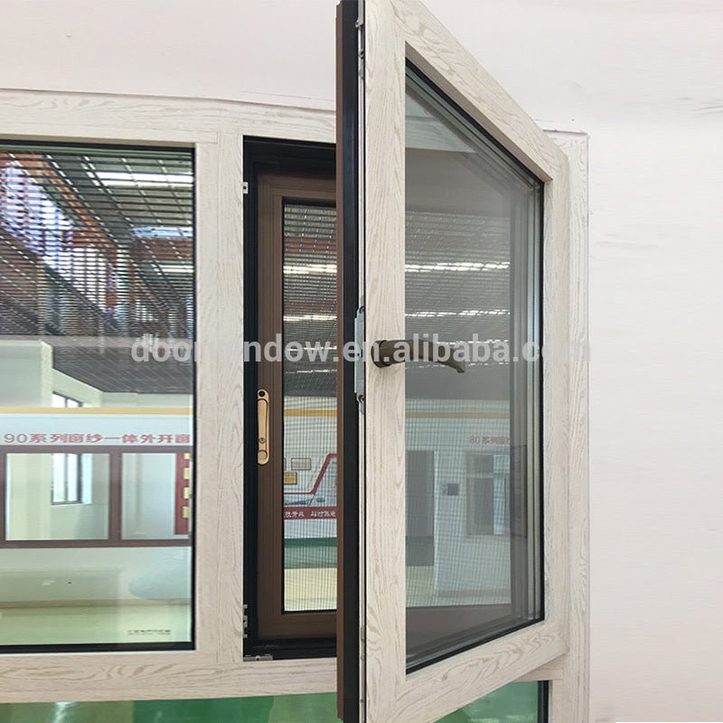 Latest design two window sashes the main window tilt and swung inwards with 304 stainless steel screen and concealed hingesby Doorwin — product image 1