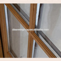 Modern grille design with Low air leakage rate performance powder coated aluminium clad wood out-swing crank handle windowby Doorwin — thumbnail 5