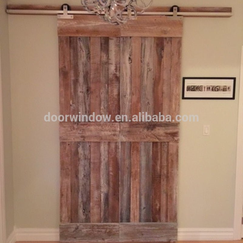 Movable plank panel wooden doors design catalogue surface stained sliding barn door for partition by Doorwin - Doorwin Group Windows & Doors