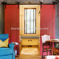 Nice looking American sliding barn door X type made of pine wood by Doorwin — thumbnail 5