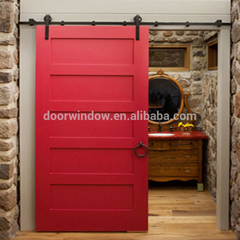 Nice looking American sliding barn door X type made of pine wood by Doorwin — product image 4