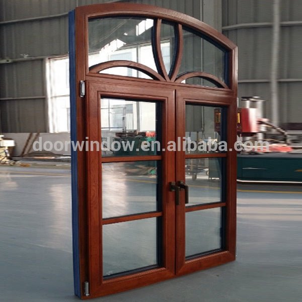 Oak wood specialty shape window with exterior aluminum by Doorwin - Doorwin Group Windows & Doors