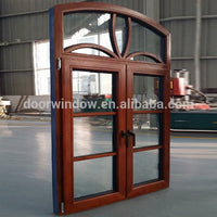 Oak wood specialty shape window with exterior aluminum by Doorwin — thumbnail 4