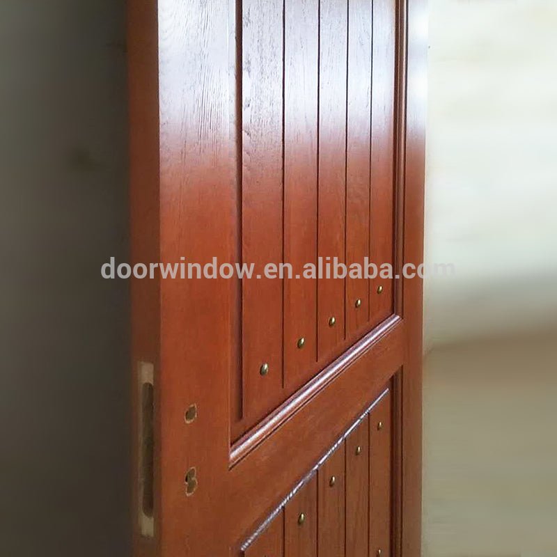 Round top design interior solid red oak wood door with copper nail by Doorwin - Doorwin Group Windows & Doors