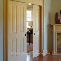 solid oak/pine wood pocket sliding door with locks for closet by Doorwin — thumbnail 4