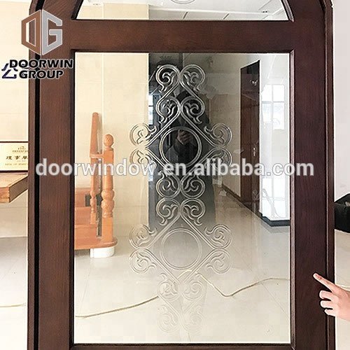 Solid wood front door with top glass and grilles design entry door for home by Doorwin — product image 4