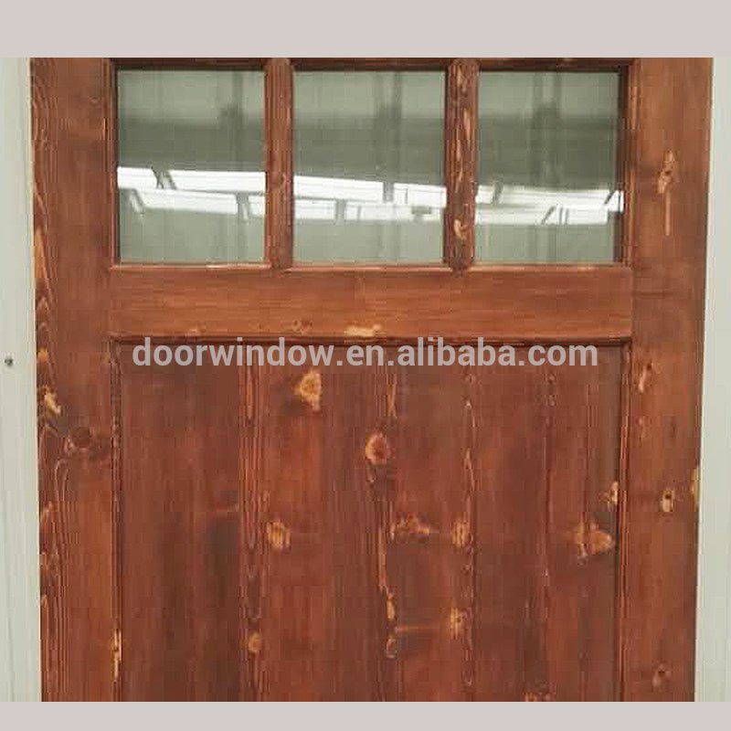 Surface stained oak wood main door designs barn door with fully tempered glass by Doorwin — product image 4