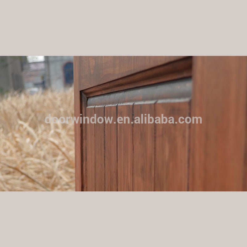 Surface stained oak wood main door designs barn door with fully tempered glass by Doorwin — product image 5