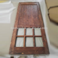 Surface stained oak wood main door designs barn door with fully tempered glass by Doorwin — thumbnail 3