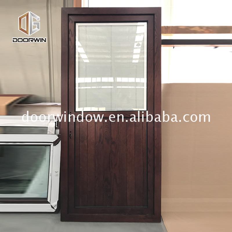 Top quality decorative front entry doors dark wood custom size - Doorwin Group Windows & Doors