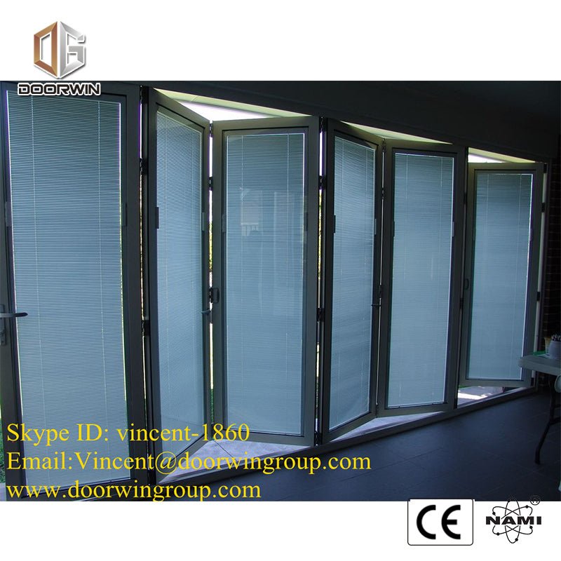 WHITE THERMAL BREAK ALUMINUM BI-FOLDING DOOR - Doorwin Group Windows & Doors