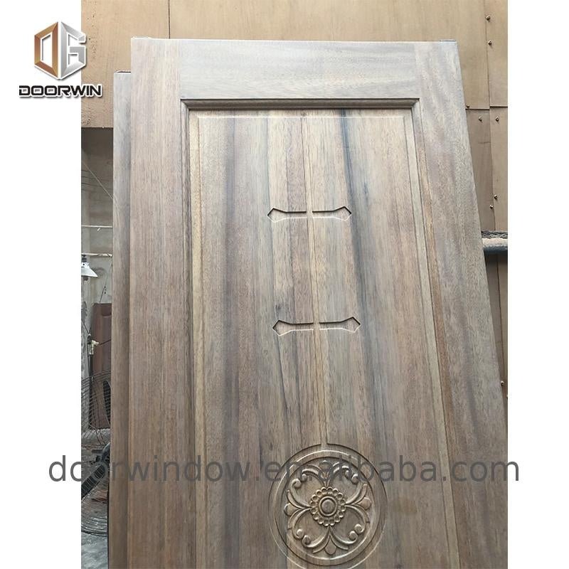 Wooden doors for arc interiors wood grain entrance door solid wood with patterns casement door - Doorwin Group Windows & Doors