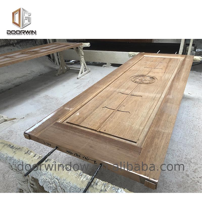 Wooden doors for arc interiors wood grain entrance door solid wood with patterns casement door - Doorwin Group Windows & Doors